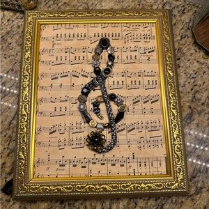 Jewelry art with treble clef, handmadee